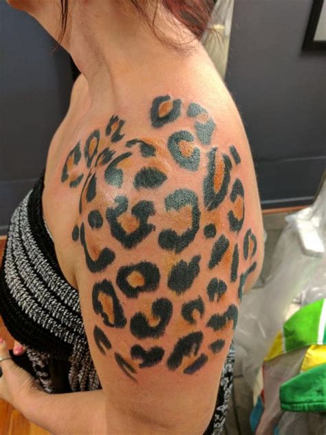 leopard print shoulder tattoo.